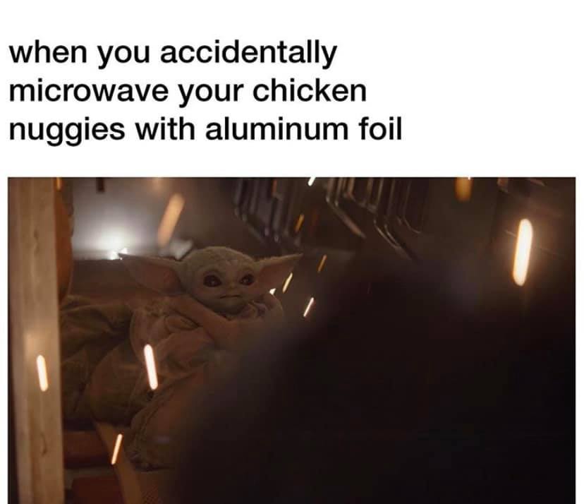 The meme is a humorous image of the character Baby Yoda from the Star Wars series, with a shocked expression on his face. The text accompanying the image reads: "When you accidentally microwave your chicken nuggets with aluminum foil". The meme is poking fun at a common mistake that can happen in the kitchen, with Baby Yoda's startled expression adding to the comedic effect.